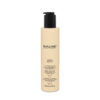 Thermo-Protective Smooth Milk. Nourishes and moisturises while eliminating frizz. Safeguards hair integrity from the heat of the flat iron