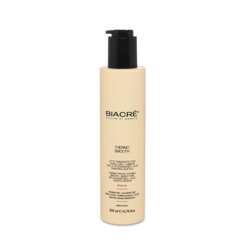 Thermo-Protective Smooth Milk. Nourishes and moisturises while eliminating frizz. Safeguards hair integrity from the heat of the flat iron
